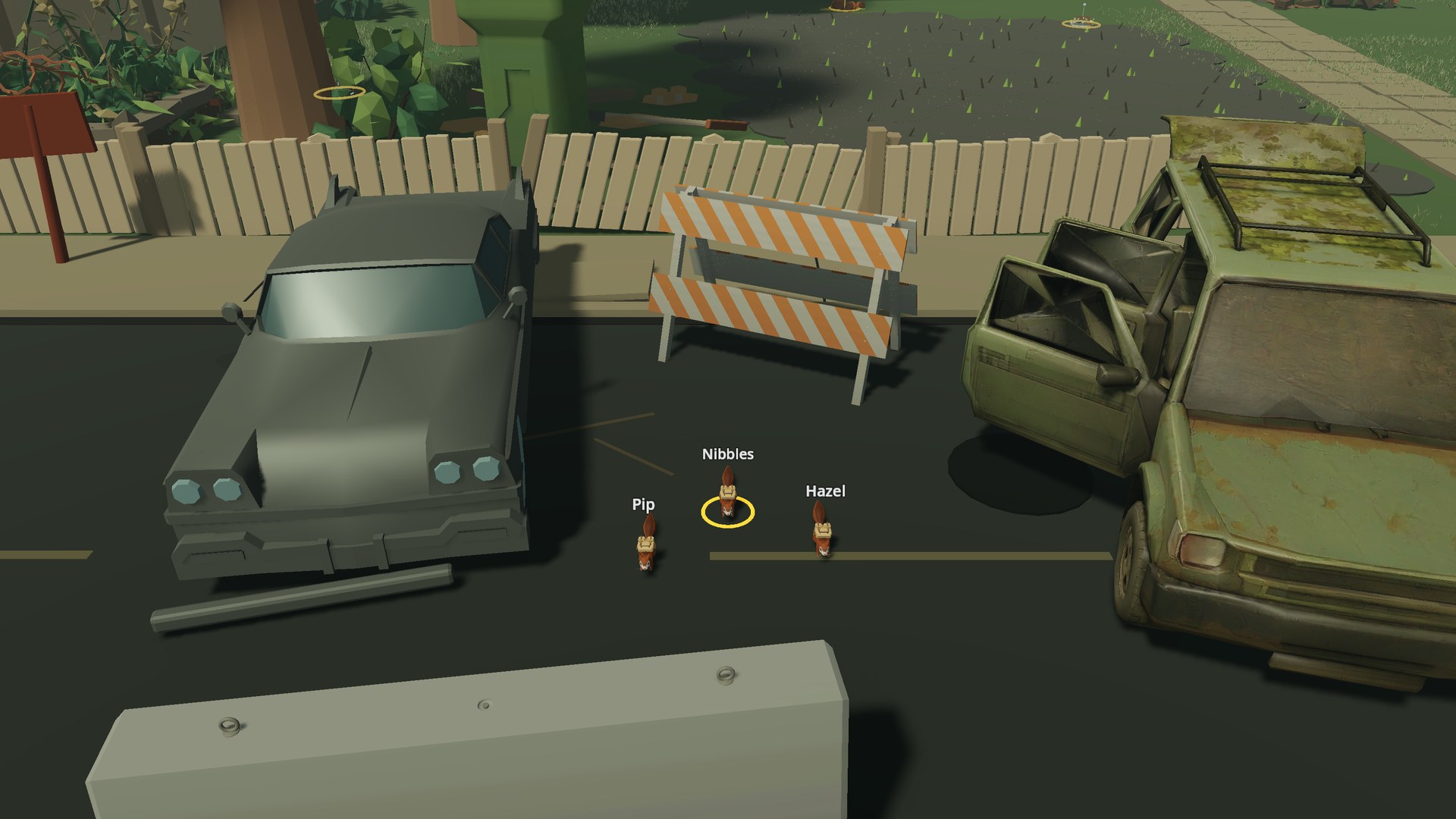 Development footage: three named squirrels — Pip, Nibbles and Hazel — stand on cracked asphalt between two abandoned cars and a road barricade that tower over them, a suburban fence and a patch of contaminated soil behind.